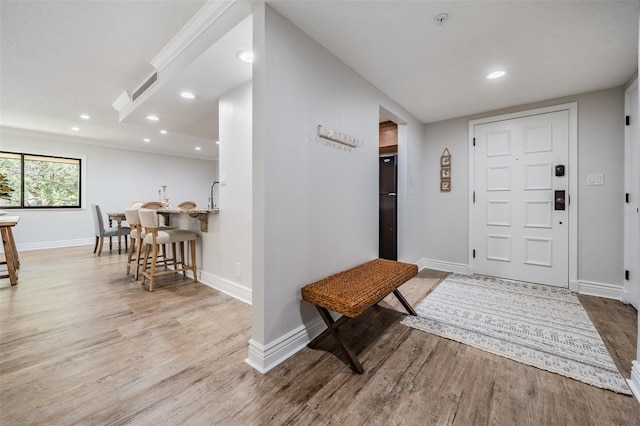 entrance foyer featuring light hardwood / wood-style flooring