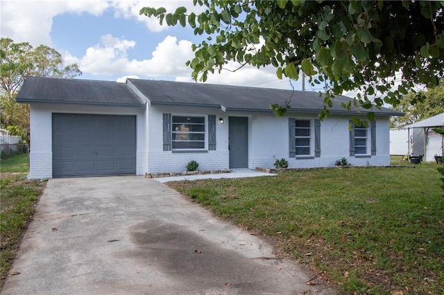 ranch-style home featuring a garage and a front lawn