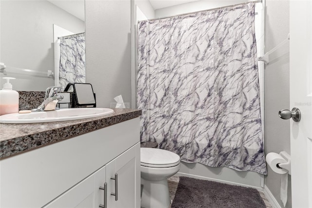 full bathroom featuring vanity, toilet, and shower / tub combo