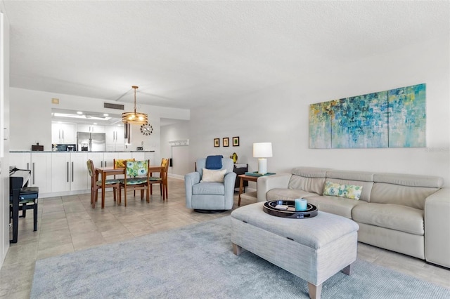 living room featuring light tile patterned floors