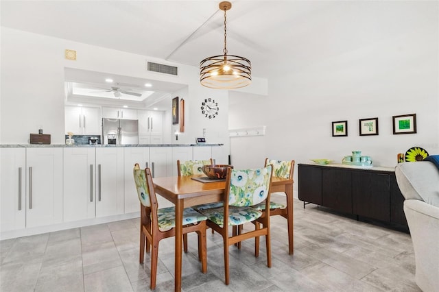 dining area with ceiling fan