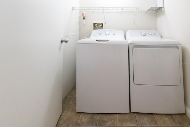 washroom with washer and clothes dryer