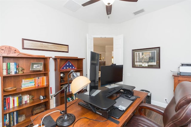 office space with hardwood / wood-style flooring and ceiling fan