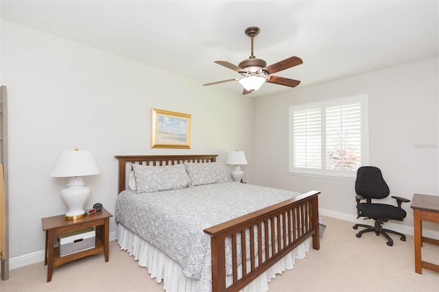 bedroom with light carpet and ceiling fan