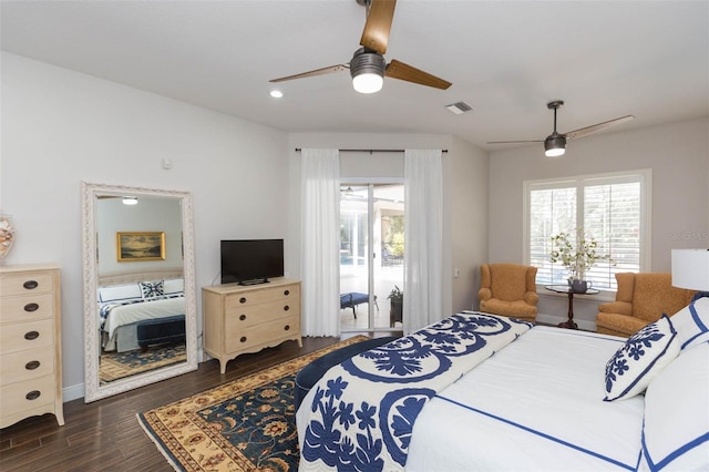 bedroom with access to exterior, ceiling fan, and dark hardwood / wood-style floors