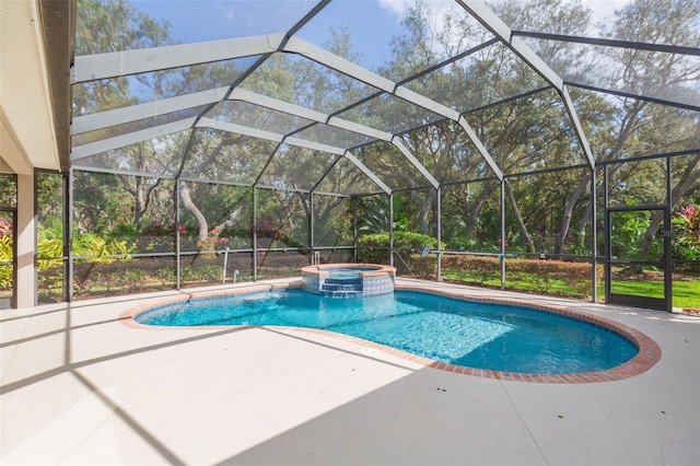 view of pool featuring a patio, a lanai, and an in ground hot tub