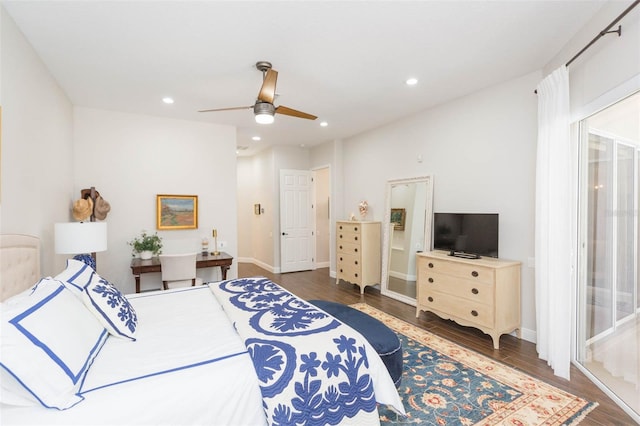 bedroom featuring dark hardwood / wood-style flooring and ceiling fan