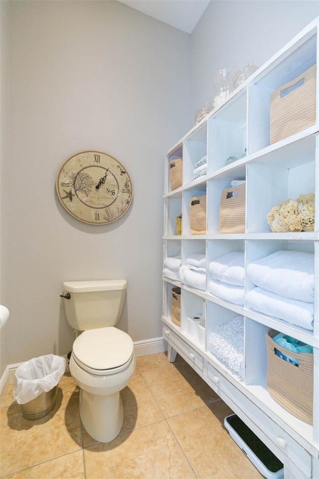 bathroom featuring tile patterned floors and toilet