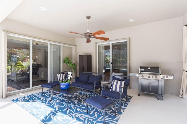 view of patio / terrace with ceiling fan, a grill, and an outdoor hangout area