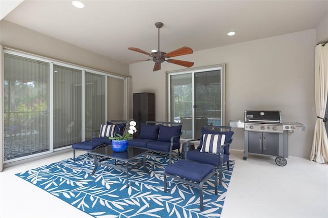 exterior space featuring ceiling fan