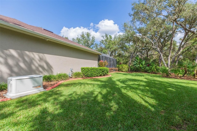 view of yard with a lanai