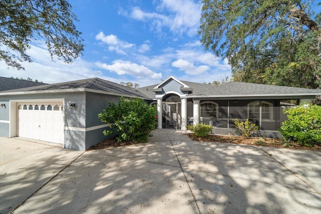 ranch-style house featuring a garage