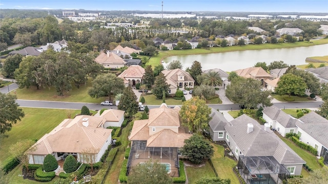 drone / aerial view with a water view