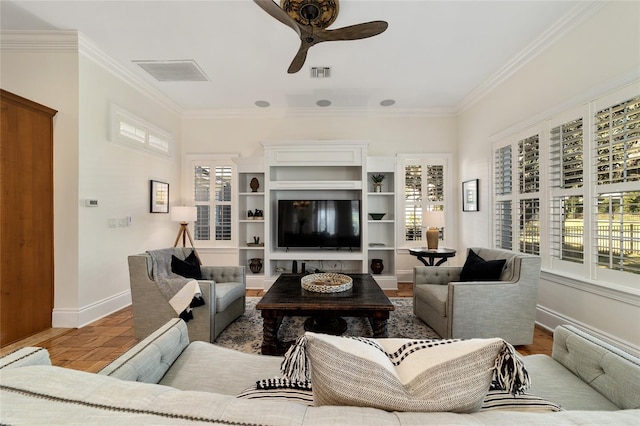 living room featuring crown molding, ceiling fan, light parquet flooring, and a wealth of natural light