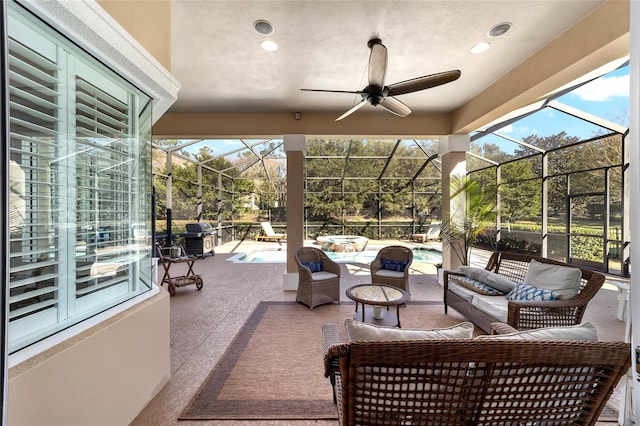 view of patio / terrace featuring ceiling fan, outdoor lounge area, grilling area, and glass enclosure