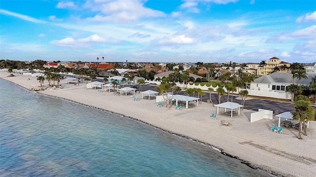 bird's eye view featuring a beach view and a water view