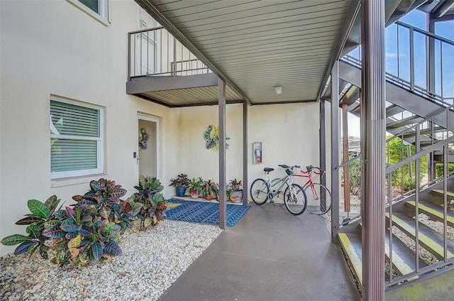 view of patio featuring a balcony