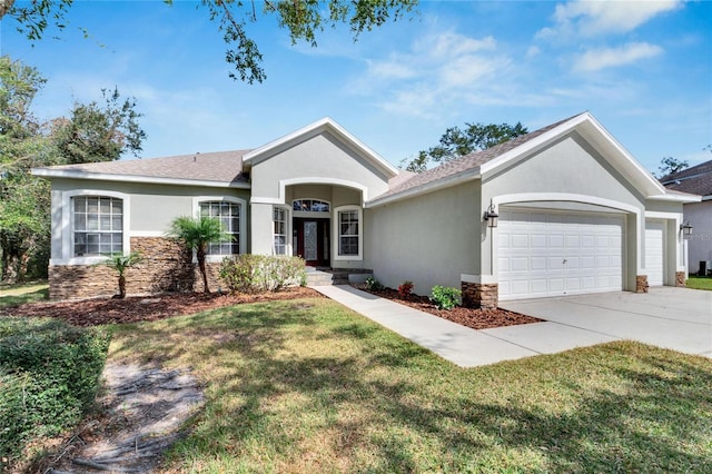 ranch-style home with a front lawn and a garage