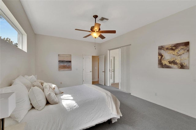 carpeted bedroom featuring ceiling fan