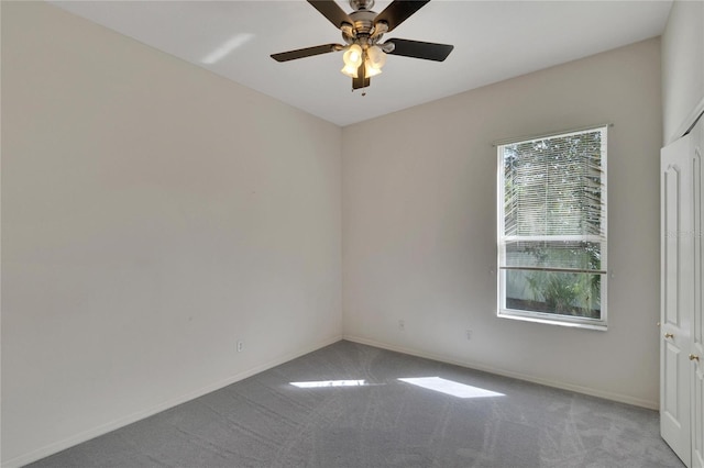 unfurnished room with light carpet and ceiling fan