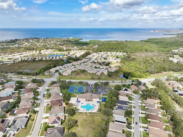 bird's eye view with a water view