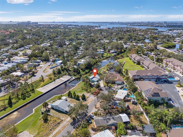 bird's eye view with a water view