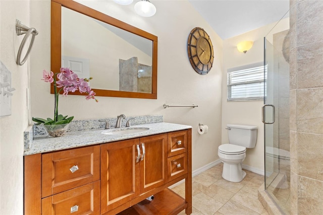 bathroom featuring vanity, vaulted ceiling, toilet, and an enclosed shower