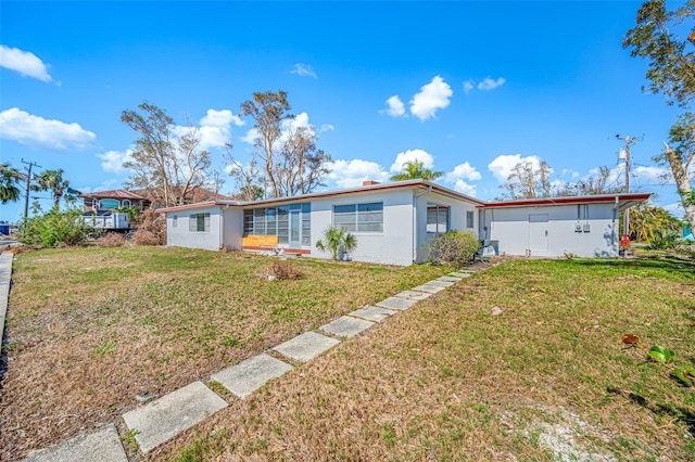 5412 Pali Way, St Pete Beach, FL 33706 - single story home with a front lawn and stucco siding