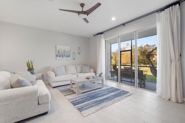 living room with light tile patterned flooring and ceiling fan