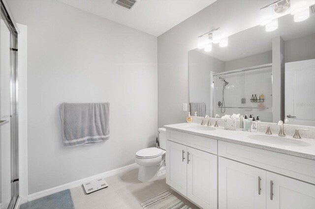 8607 Canyon Creek Trl, Parrish, FL 34219 - bathroom featuring double vanity and a shower stall