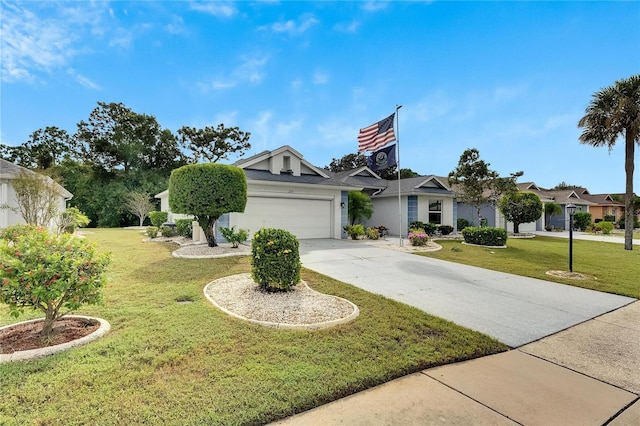 view of front of property featuring a front yard and a garage