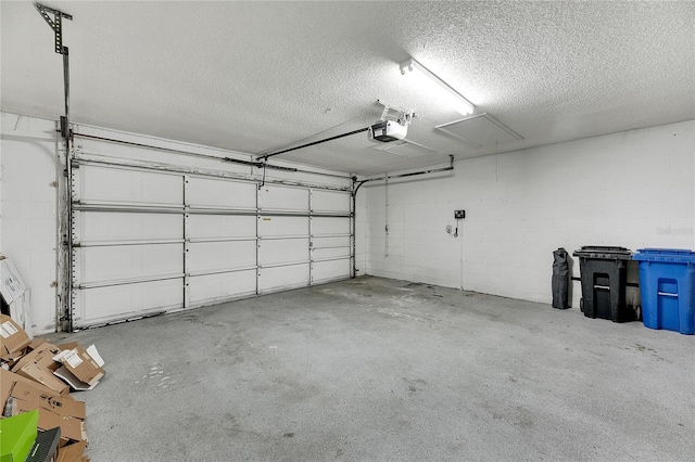 garage featuring a garage door opener