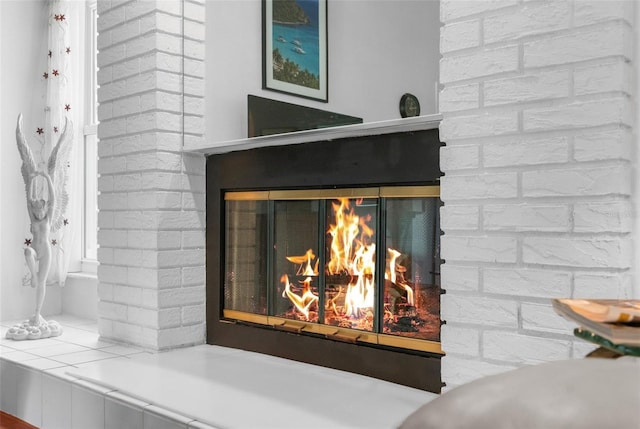 details featuring a multi sided fireplace