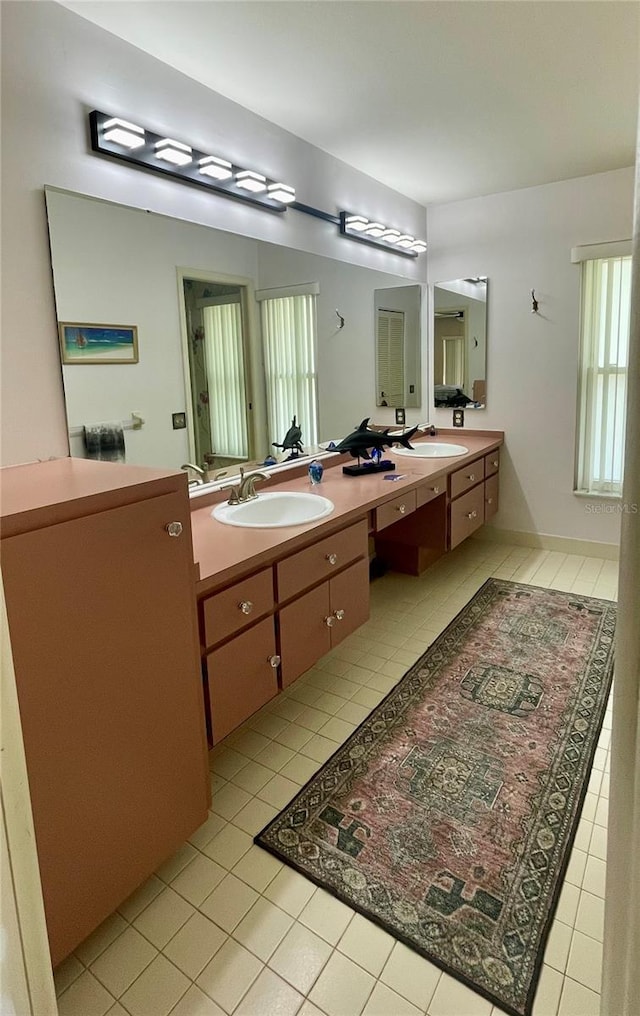 bathroom featuring vanity and tile patterned flooring