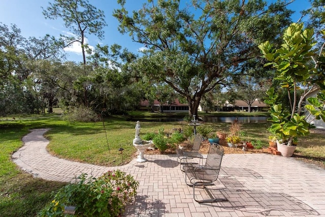 view of patio / terrace with a water view