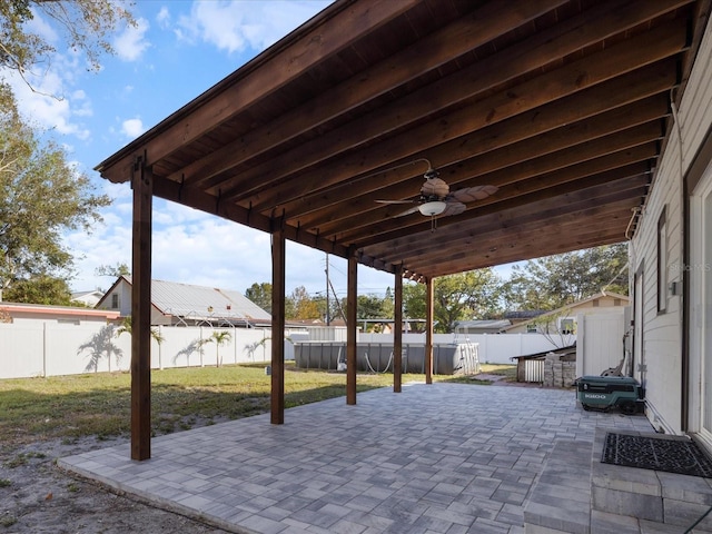 view of patio / terrace with ceiling fan and a fenced backyard