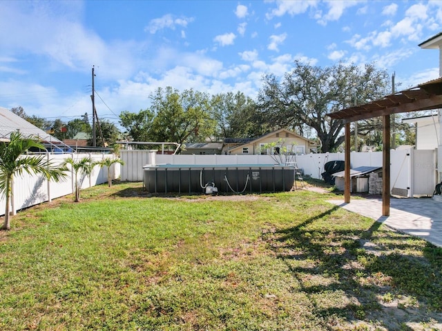 view of yard featuring a fenced backyard and a fenced in pool