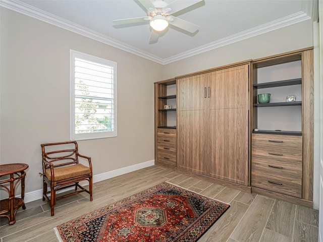 sitting room with light hardwood / wood-style floors, crown molding, and ceiling fan