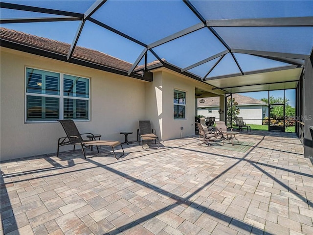 4836 Four Lakes Cir SW, Vero Beach, FL 32968 - view of patio / terrace featuring glass enclosure