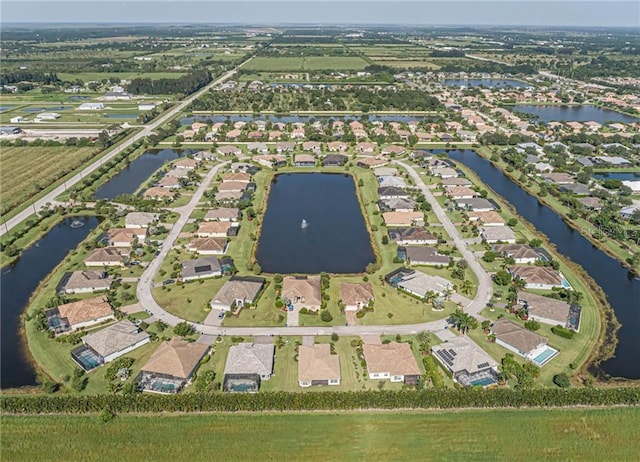 4836 Four Lakes Cir SW, Vero Beach, FL 32968 - aerial view featuring a water view and a residential view
