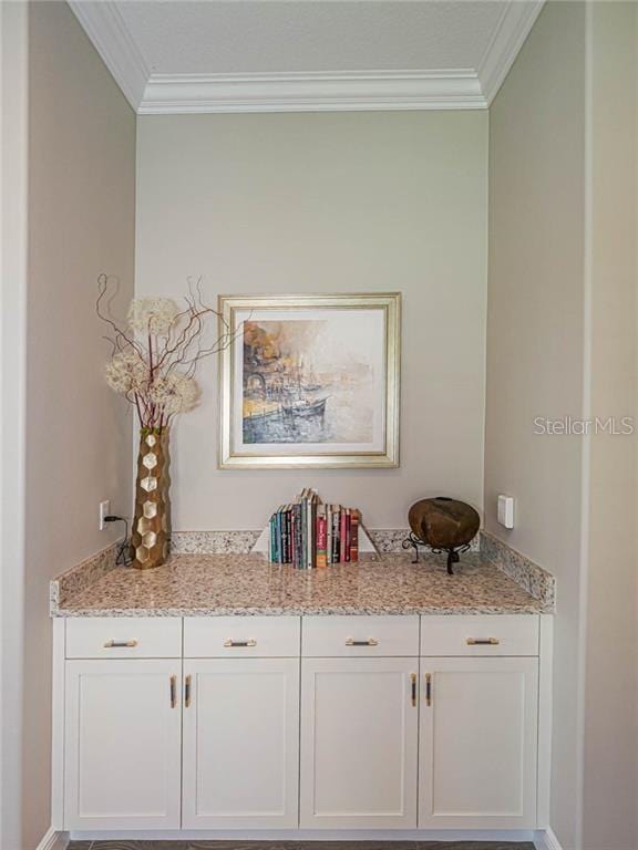 4836 Four Lakes Cir SW, Vero Beach, FL 32968 - room details featuring crown molding and baseboards