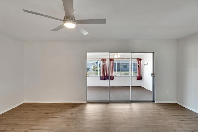 unfurnished room featuring wood-type flooring and ceiling fan