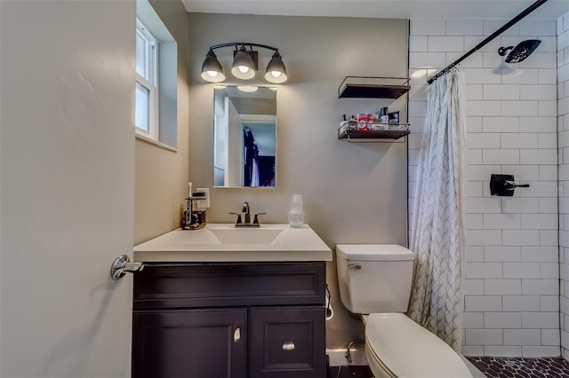 bathroom with toilet, a shower with curtain, and vanity