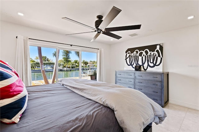 tiled bedroom featuring a water view, access to outside, and ceiling fan