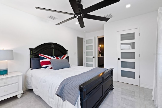 bedroom featuring connected bathroom and ceiling fan