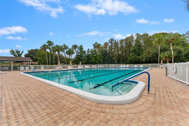 3361 Scorecard Dr Unit 0, New Port Richey, FL 34655 - community pool featuring view of scattered trees and a patio