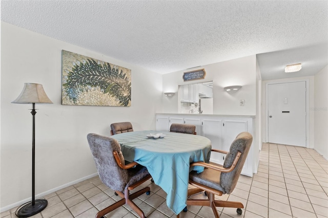 3361 Scorecard Dr Unit 0, New Port Richey, FL 34655 - dining area featuring a textured ceiling and light tile patterned floors