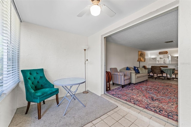 3361 Scorecard Dr Unit 0, New Port Richey, FL 34655 - sitting room featuring tile patterned flooring and ceiling fan