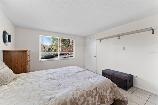 3361 Scorecard Dr Unit 0, New Port Richey, FL 34655 - tiled bedroom with baseboards and a textured ceiling