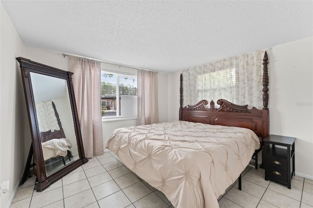 3361 Scorecard Dr Unit 0, New Port Richey, FL 34655 - bedroom featuring light tile patterned flooring and a textured ceiling